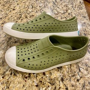 New, never worn, moss green Natives, size J4